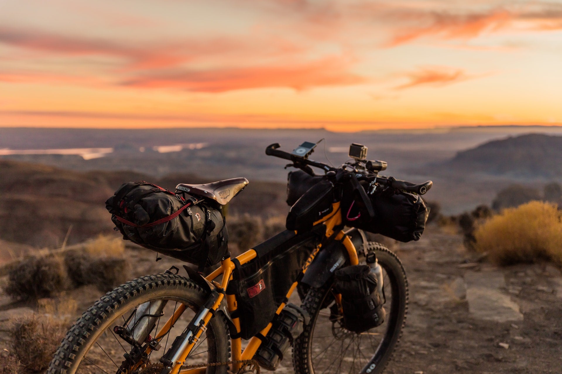 mountain bike on trail at sunset
