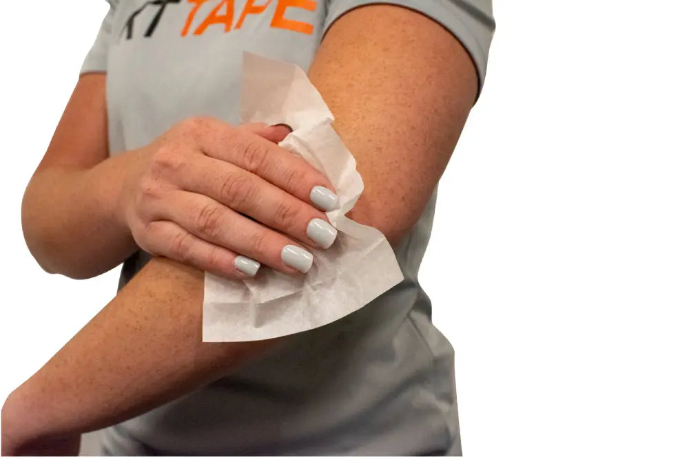 how to apply KT Kinesiology Tape and how to get it to stick better