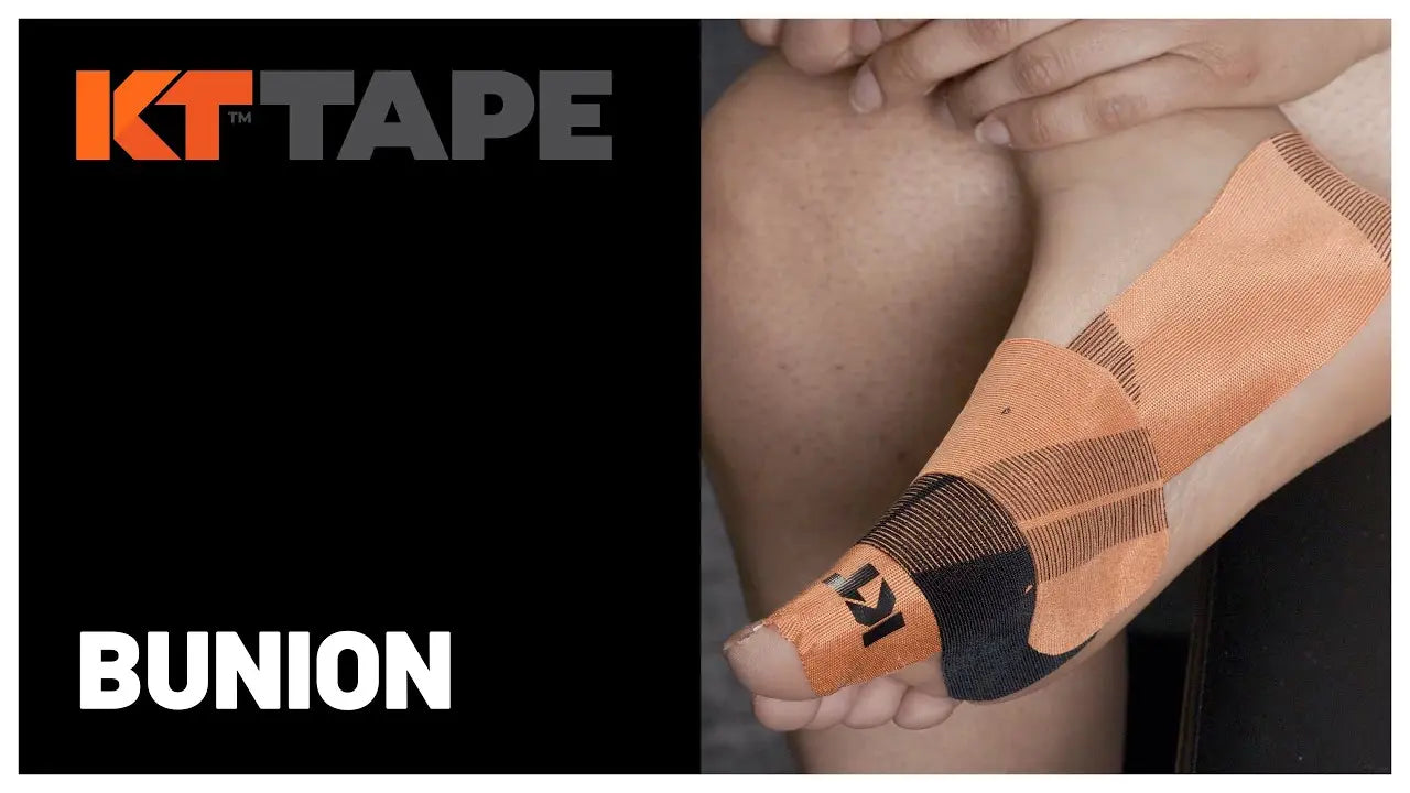 KT Tape Pro Jet Black roll shown in close-up, featuring durable elastic kinesiology tape for muscle support and pain relief during training or recovery.