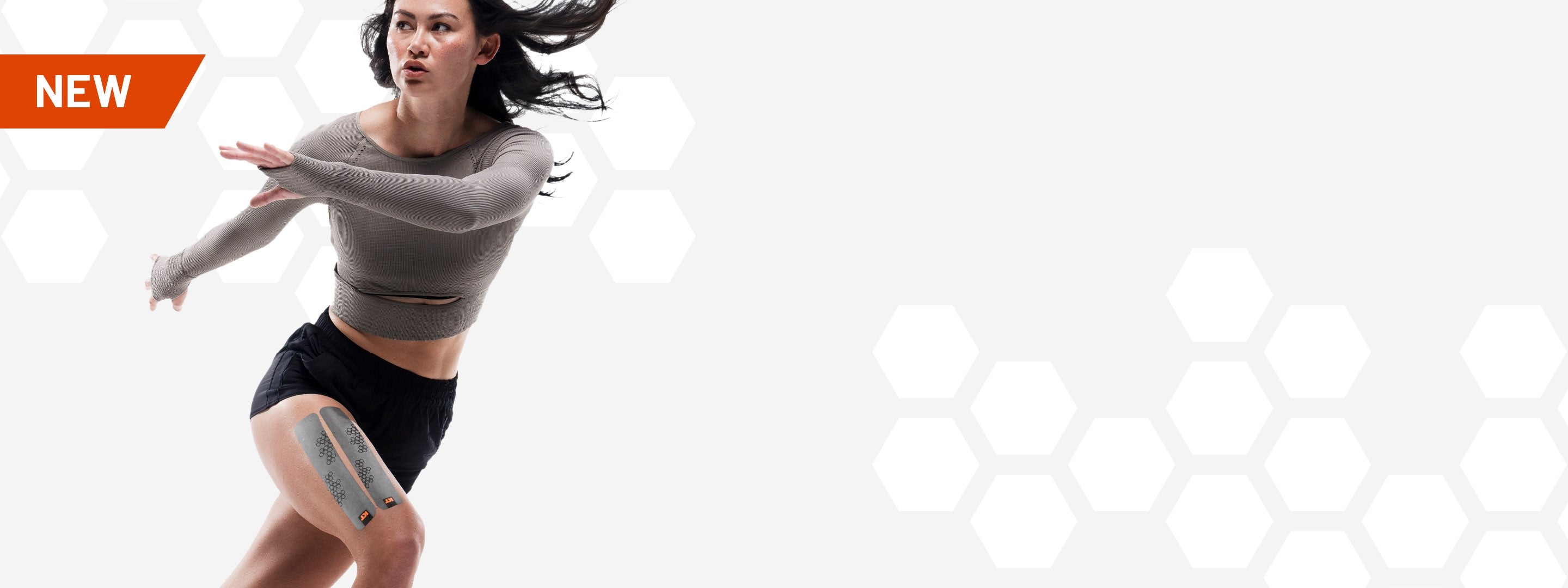 Woman exercising wearing KT Tape Pro Oxygen
